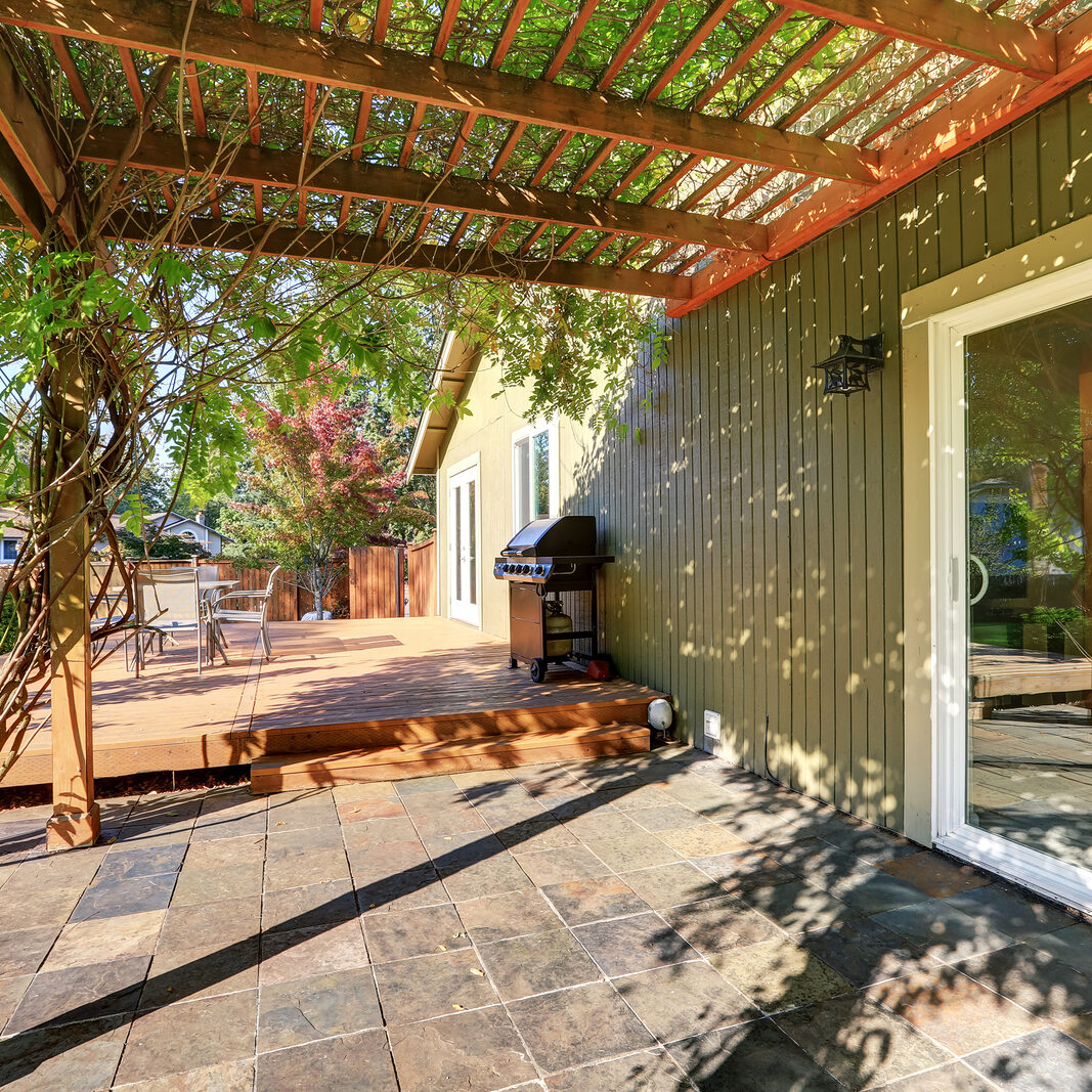 Back Yard With Pergola , Tile Floor And Wooden Walkout Deck CABANAS