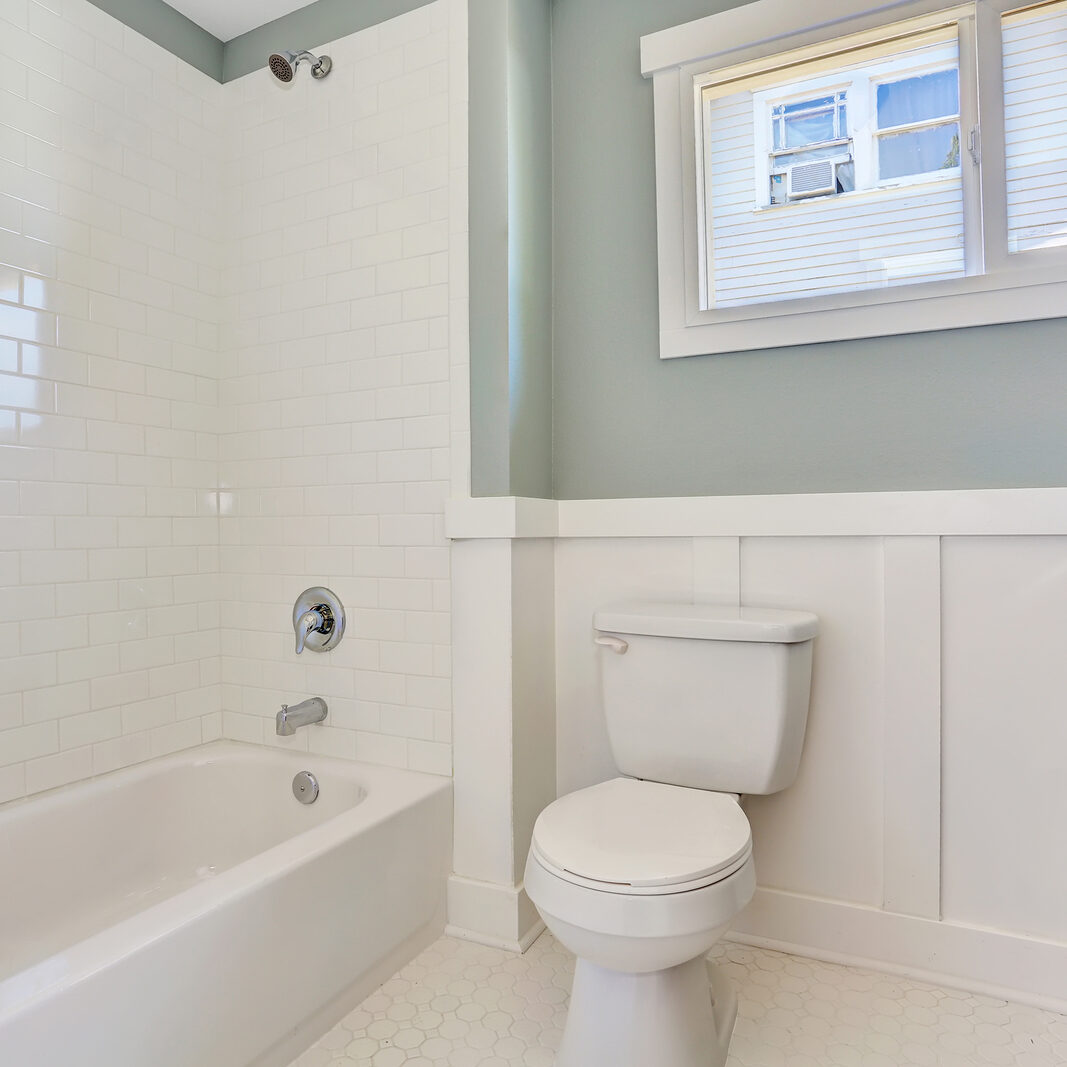 Blue Bathroom Interior With Black Vanity Cabinet, Toilet And Whi TOP BRANDS