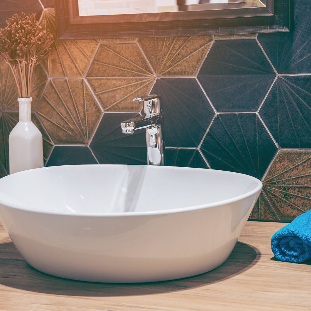Interior Of Bathroom With Sink Basin Faucet And Mirror. Modern D Interior of bathroom with sink basin faucet and mirror. Modern design of bathroom.