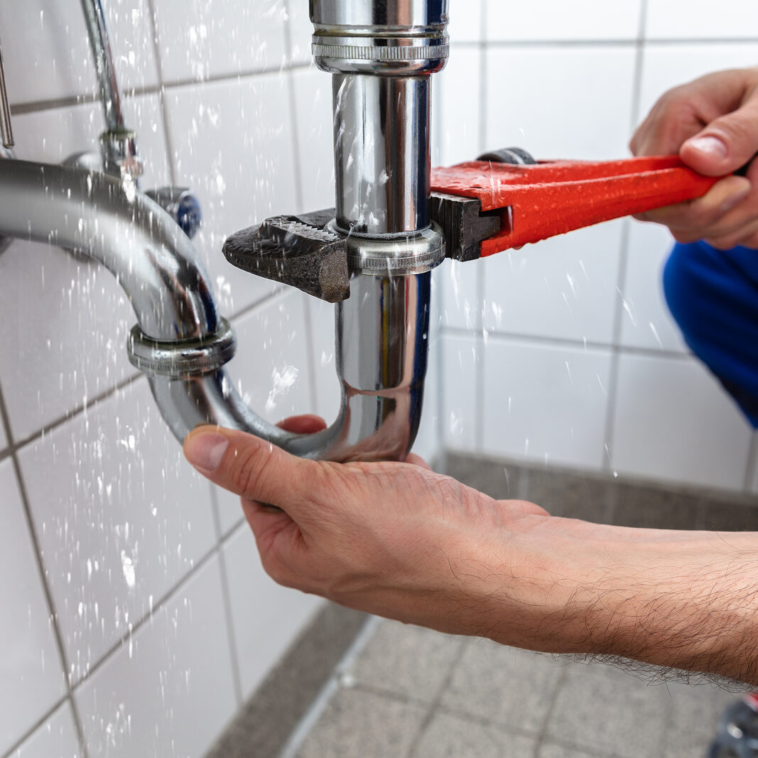 Plumber Repairing Sink Pipe Leakage PLUMBING